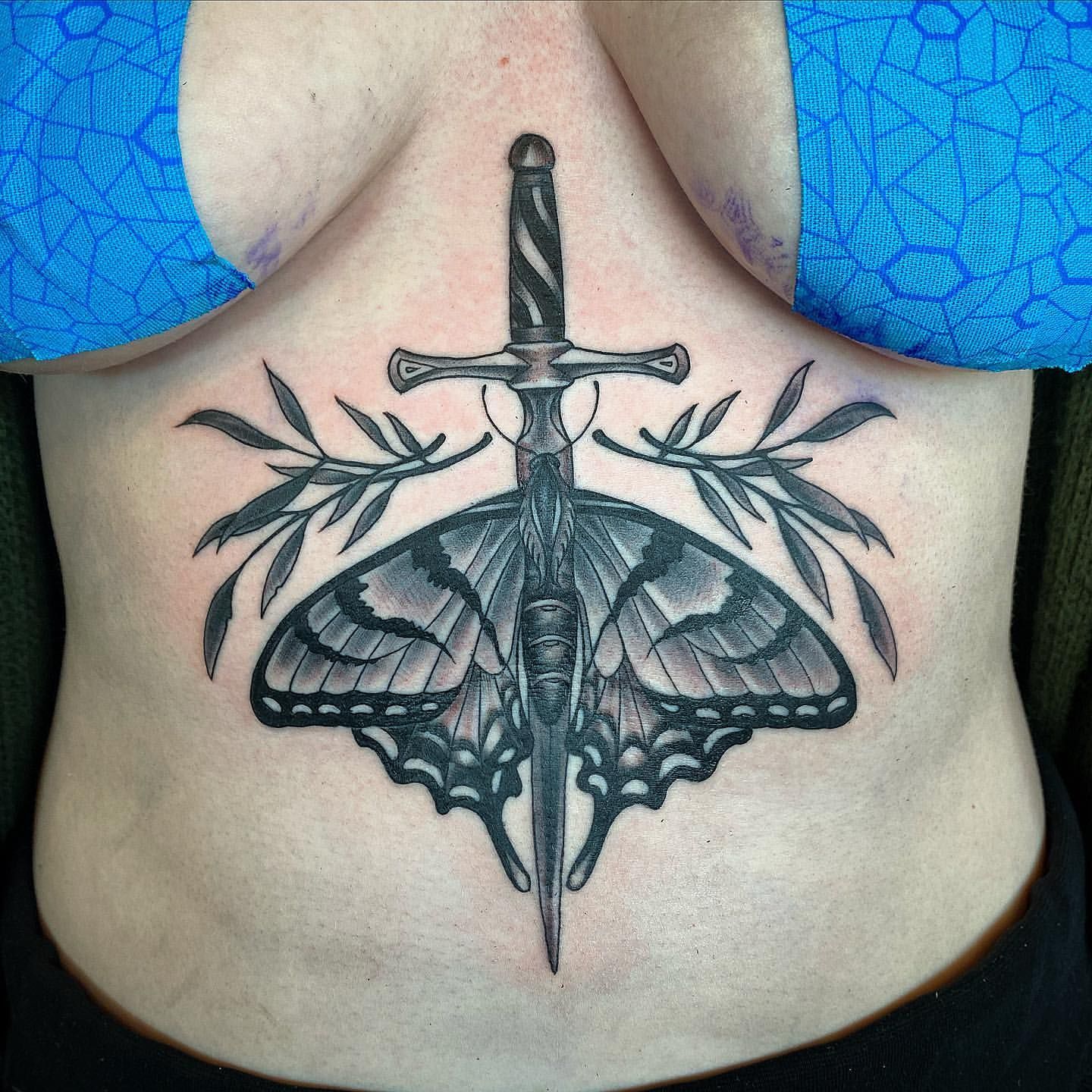 Moth and Dagger Tattoo by Dale Moostoos at Crimson Empire Tattoo in Edmonton Alberta Canada