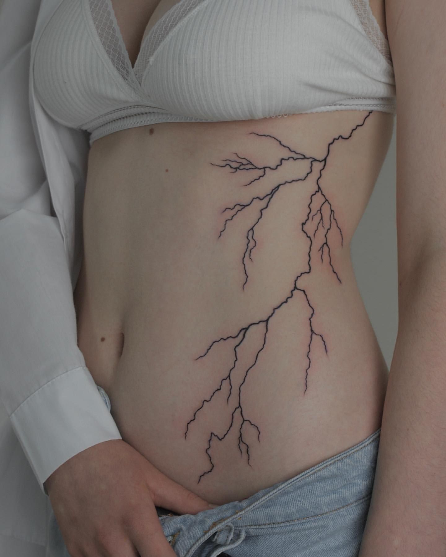 Lightning Tattoo by Liza Kruk at Silver Ghost Tattoo in Edmonton Alberta Canada