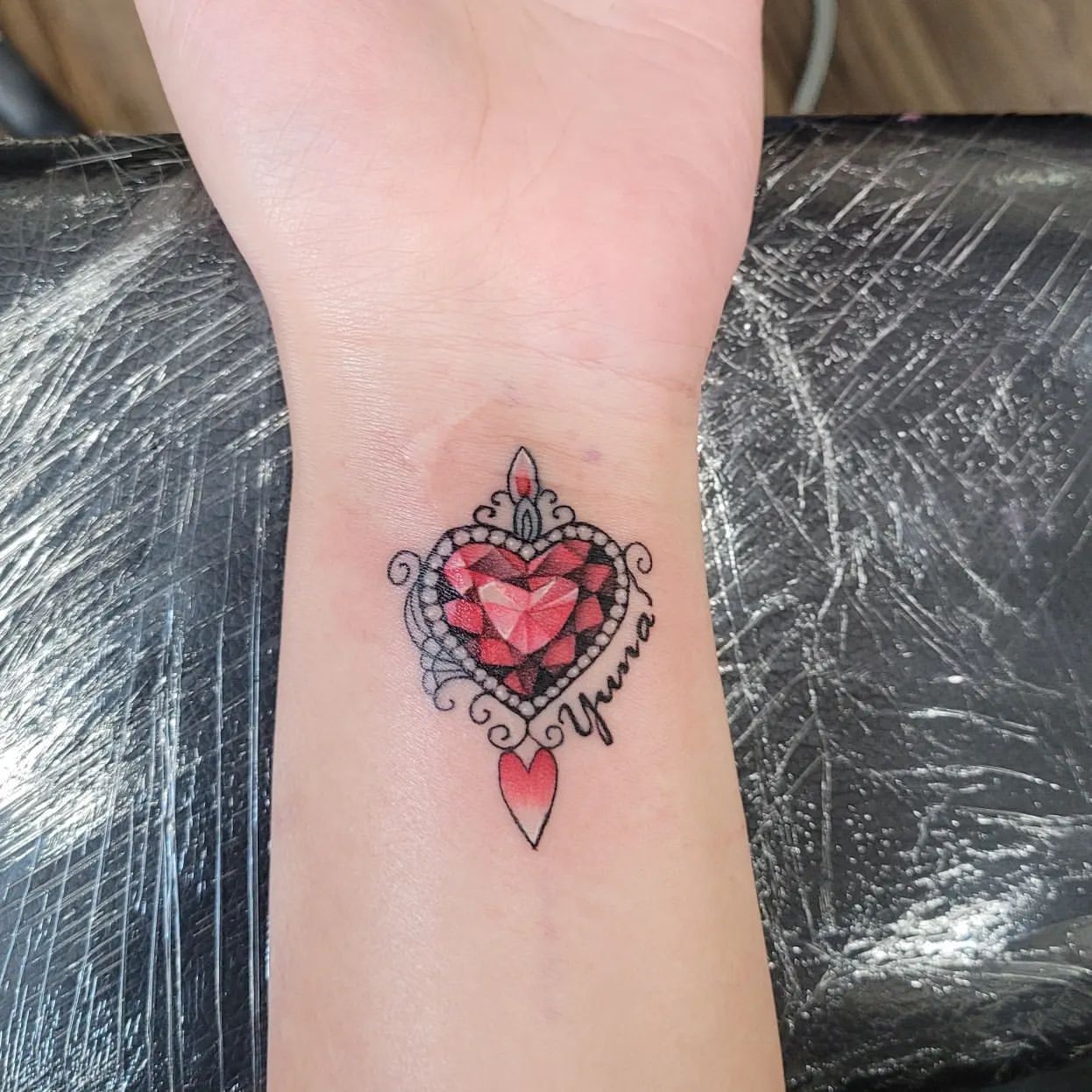Ruby Gem Tattoo by Ian Wang at Black Gold Tattoo Co in Edmonton Alberta Canada
