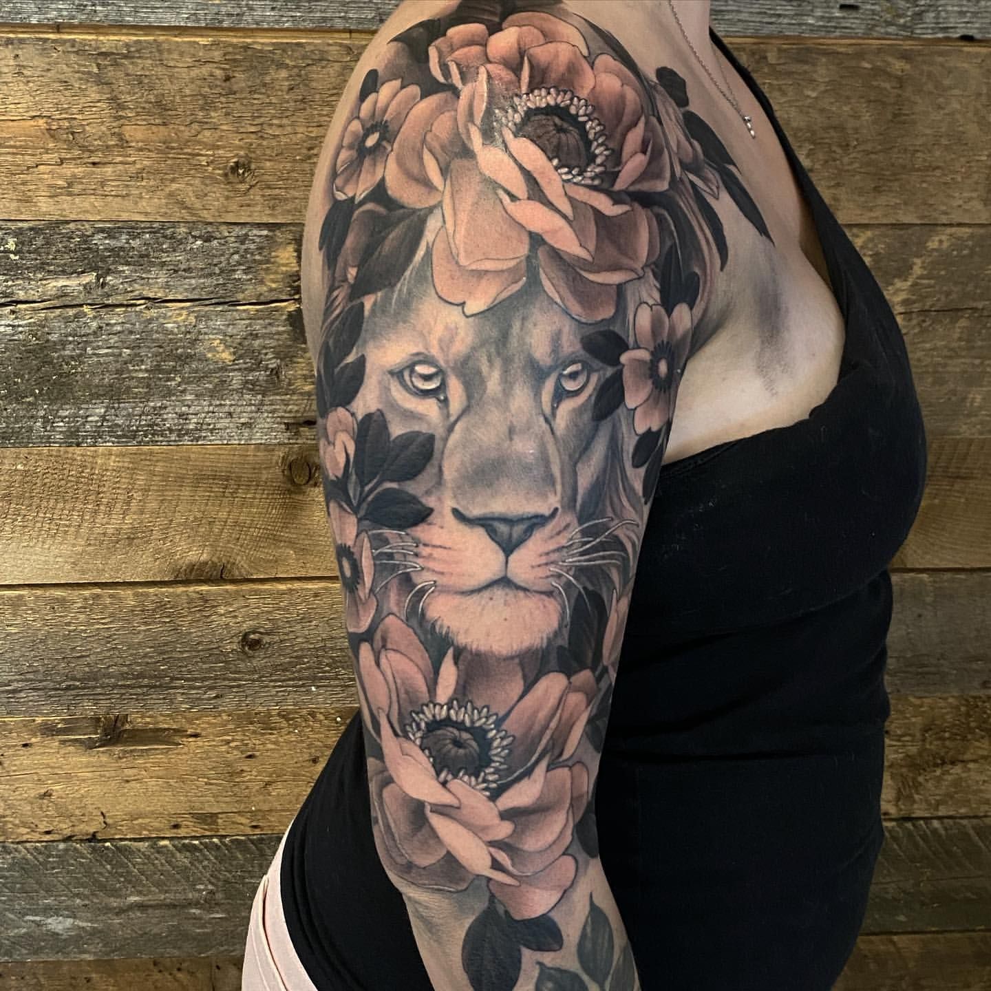 Lion and Floral Tattoo by Sasha Day at Crimson Empire Tattoo in Edmonton Alberta Canada