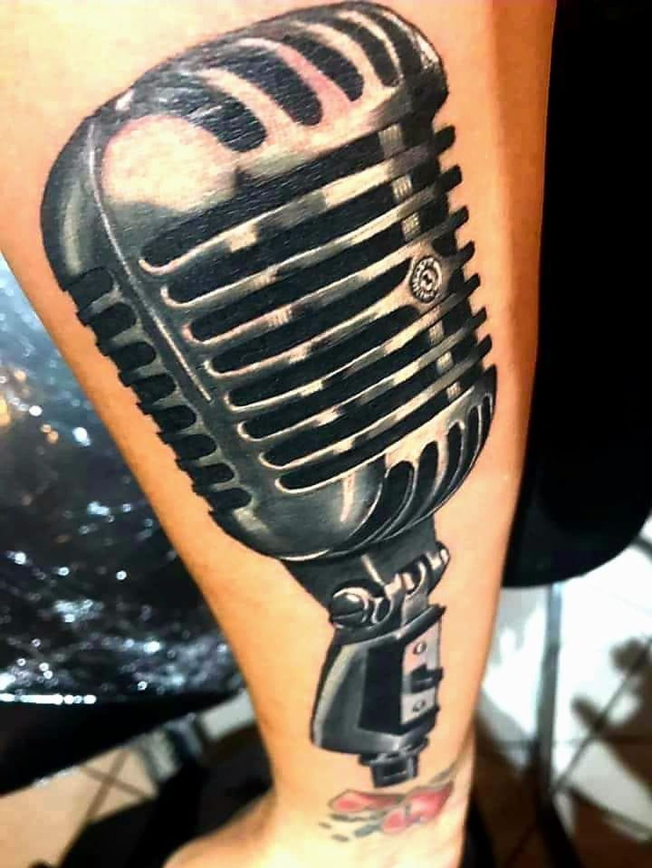 Microphone Tattoo by Sly at Silver Ghost Tattoo in Edmonton Alberta Canada