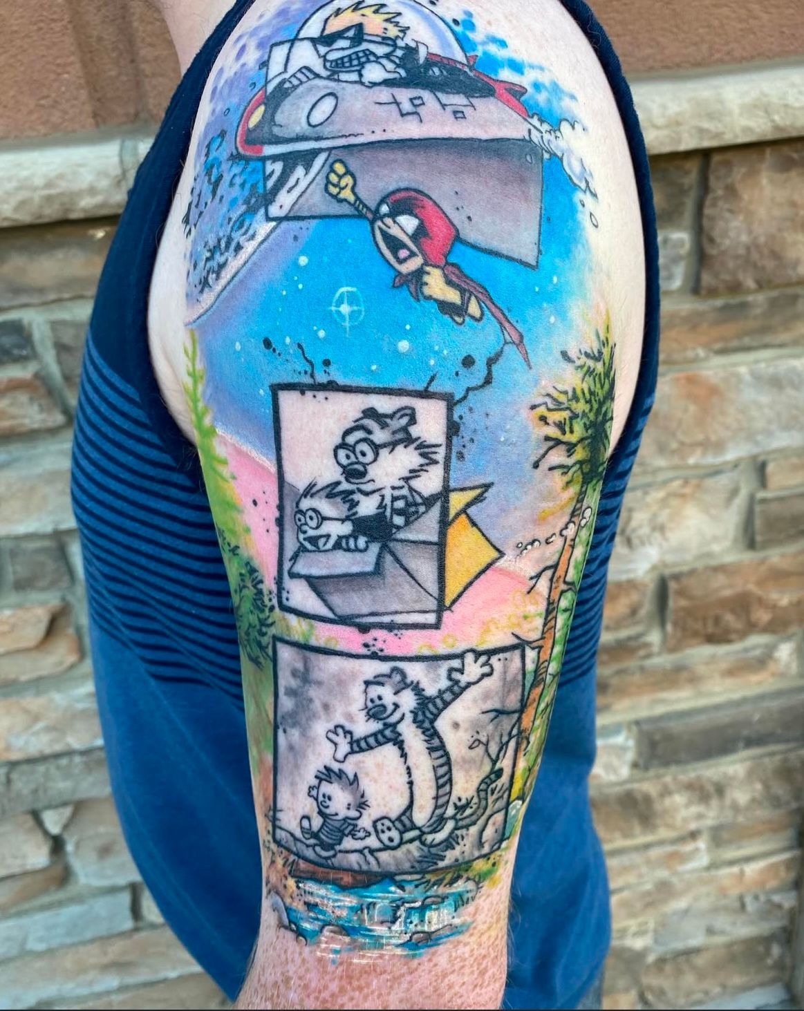 Calvin and Hobbs Tattoo by Chris Labrenz at Black Gold Tattoo Co in Edmonton Alberta Canada