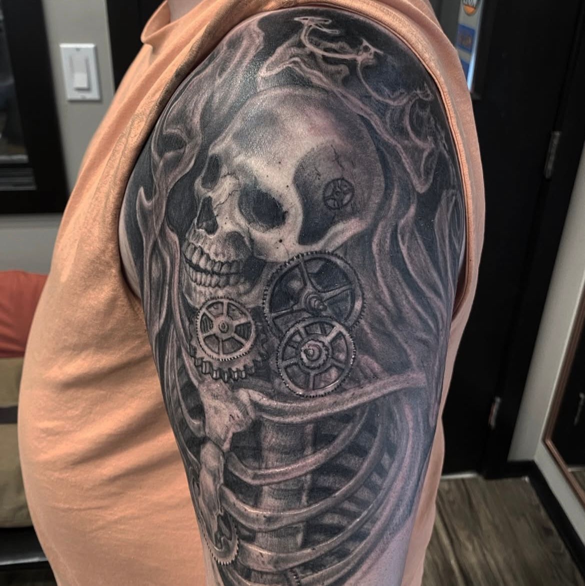 Skeleton and Gears Tattoo by Steve Hayes at Black Gold Tattoo Co in Edmonton Alberta Canada