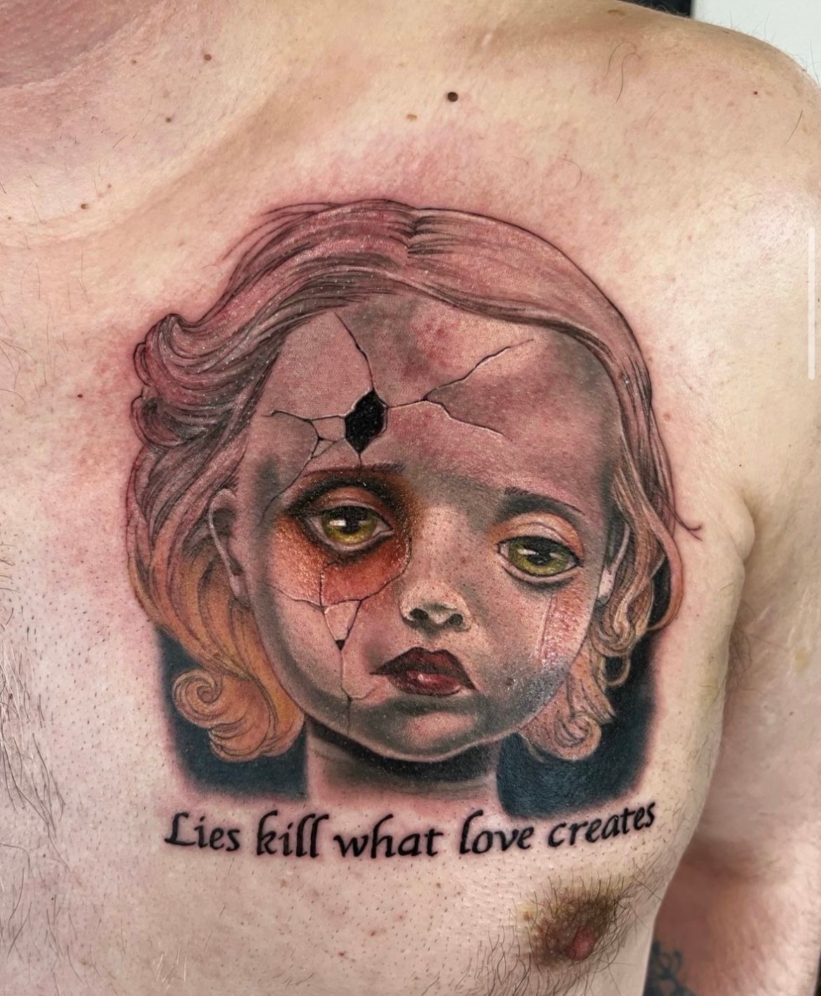 Broken Doll Tattoo by Chad Lavers at Crimson Empire Tattoo in Edmonton Alberta Canada