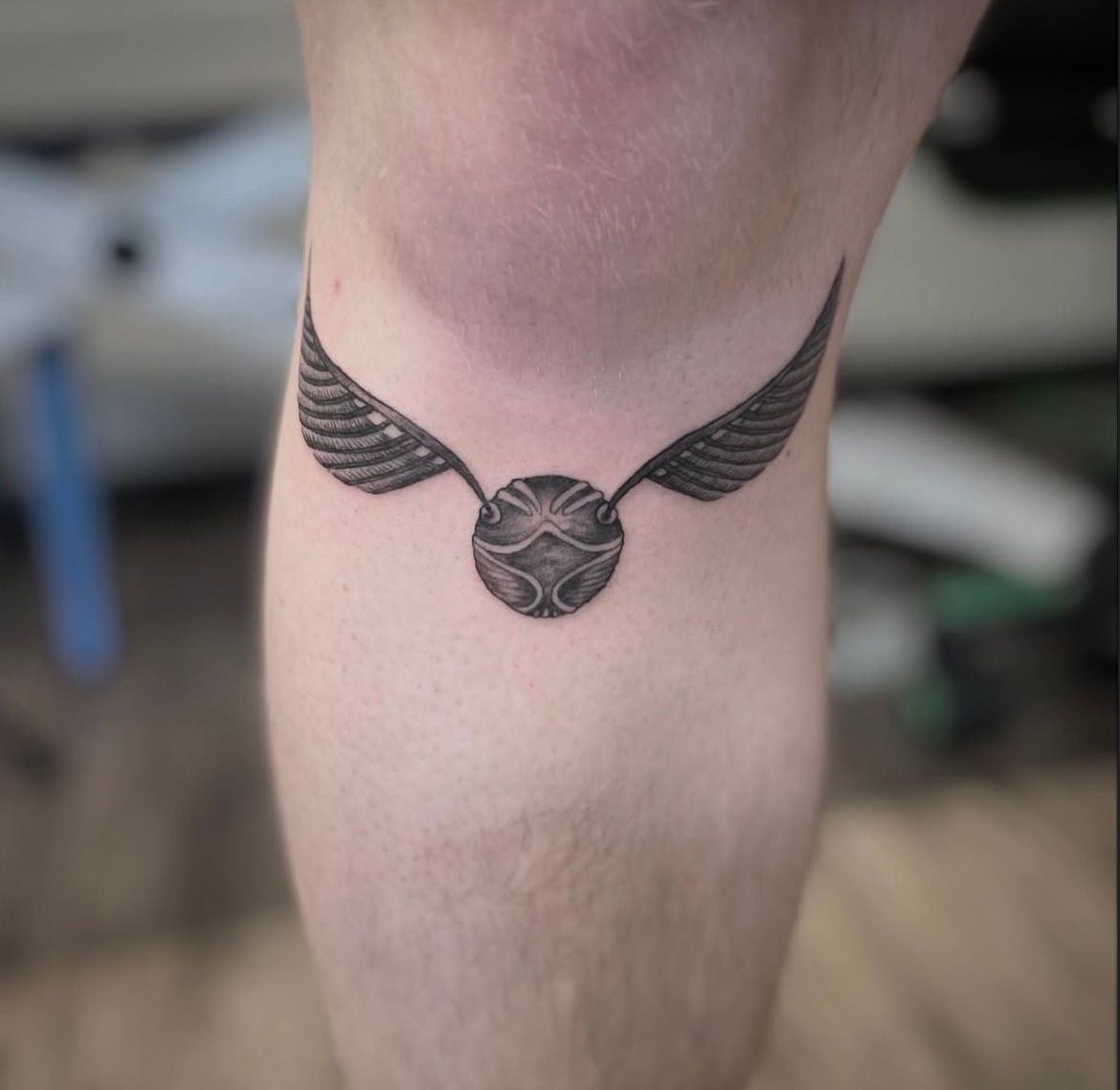 Golden Snitch Tattoo by Jess Alther at Black Gold Tattoo Co in Edmonton Alberta Canada