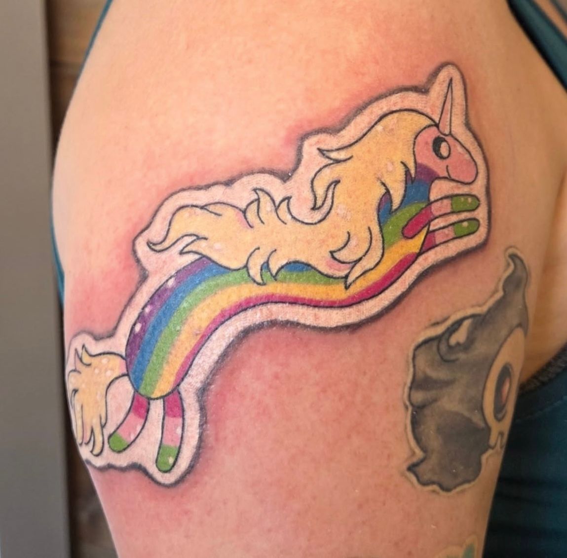 Unicorn Sticker Tattoo by Sheila Anderson at Crimson Empire Tattoo in Edmonton Alberta Canada