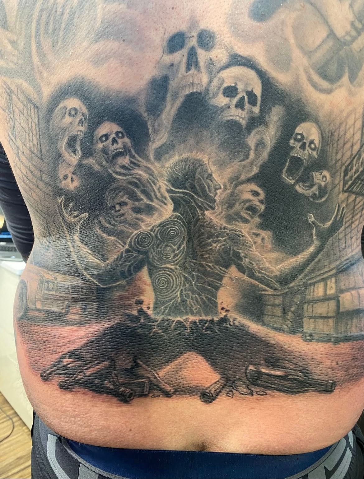 Battling Demons Backpiece by Steve Hayes at Black Gold Tattoo Co in Edmonton Alberta Canada