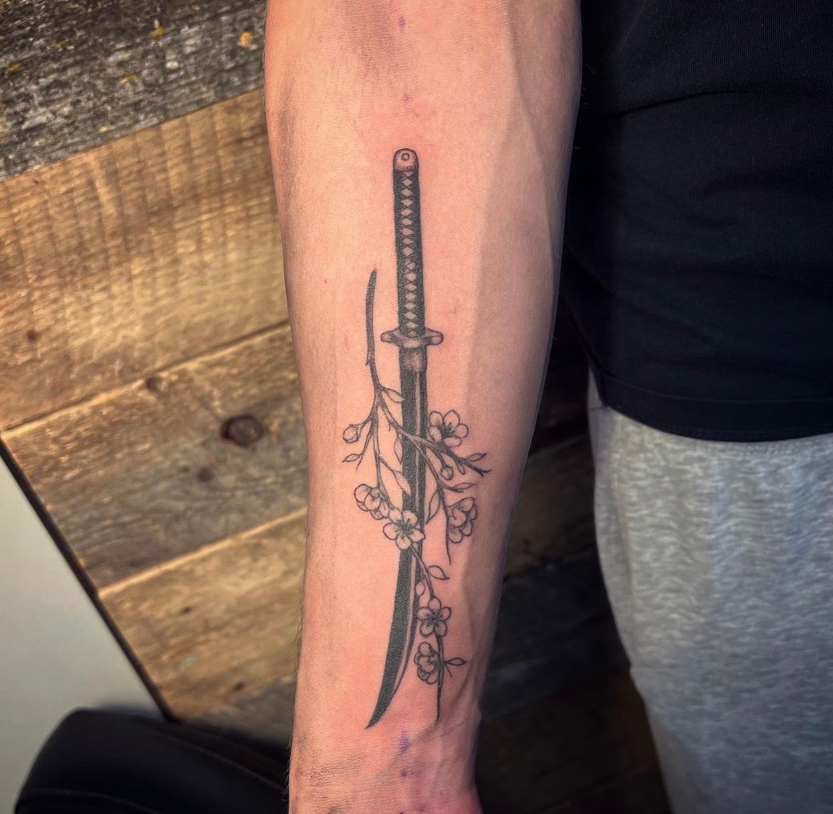 Samurai Sword and Cherry Blossom Tattoo by Vinny Nguyen at Crimson Empire Tattoo in Edmonton Alberta Canada