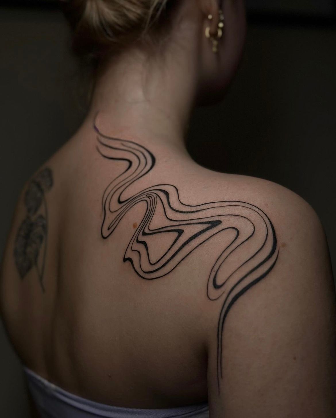 Abstract Line Work Tattoo by Anastasiya at Silver Ghost Tattoo in Edmonton Alberta Canada