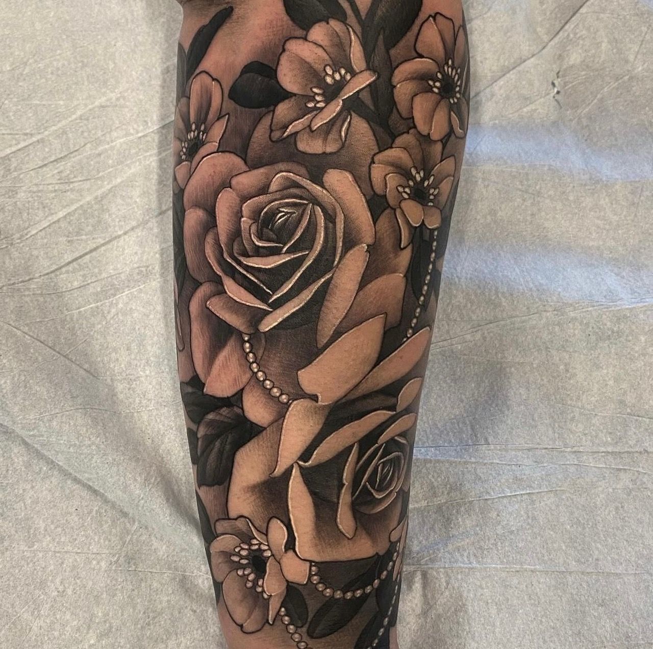 Roses Tattoo by Sasha Day at Crimson Empire Tattoo in Edmonton Alberta Canada
