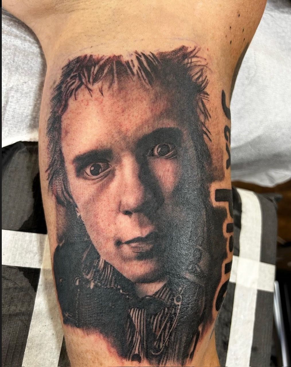 Johnny Rotten Tattoo by Alan Coates at Silver Ghost Tattoo in Edmonton Alberta Canada