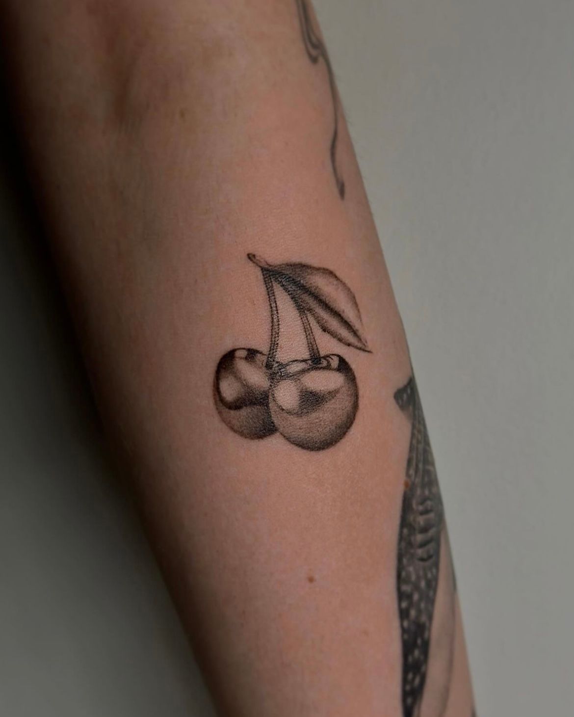 Cherry Tattoo by Anastasiya at Silver Ghost Tattoo in Edmonton Alberta Canada