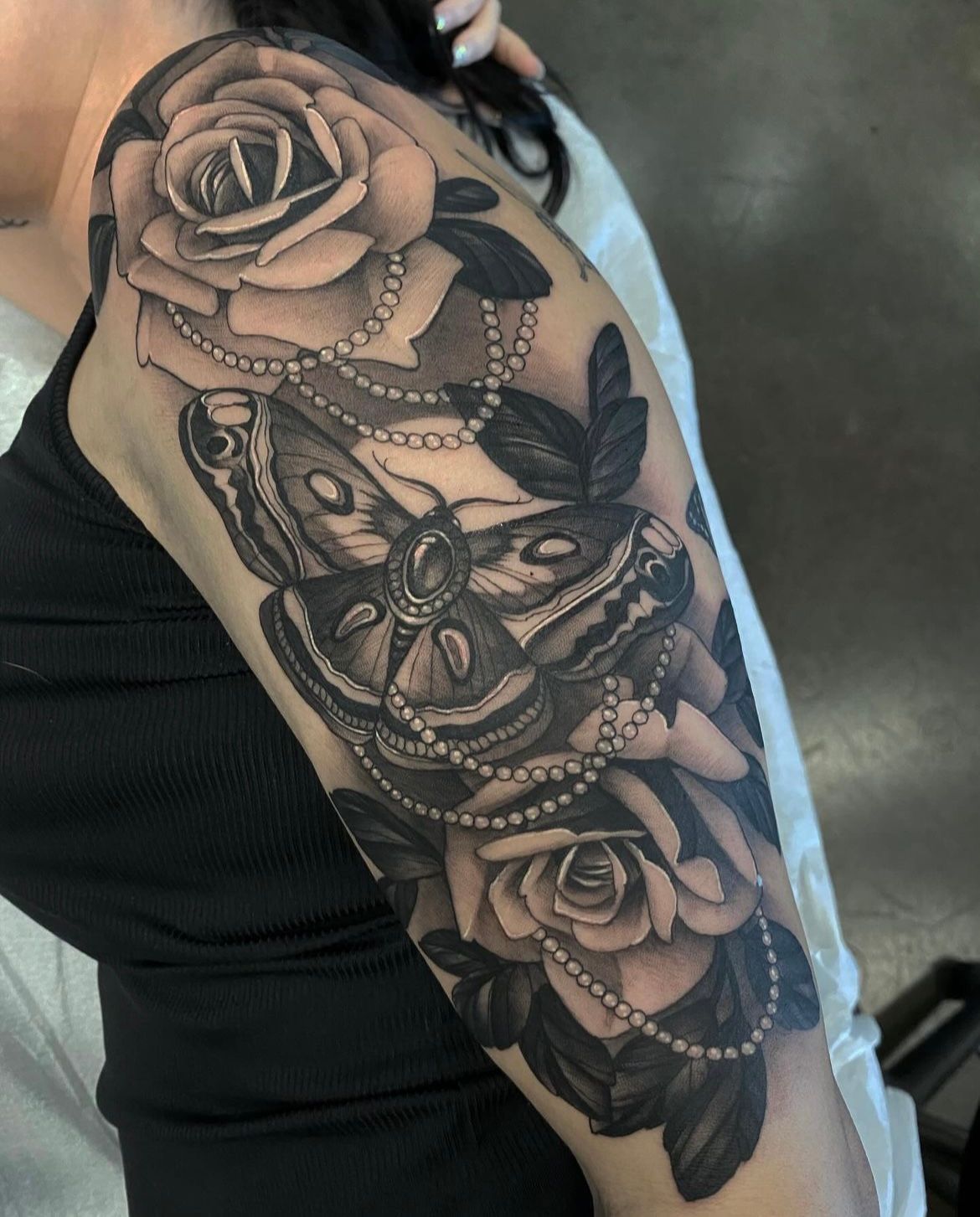 Moth and Roses Tattoo by Sasha Day at Crimson Empire Tattoo in Edmonton Alberta Canada