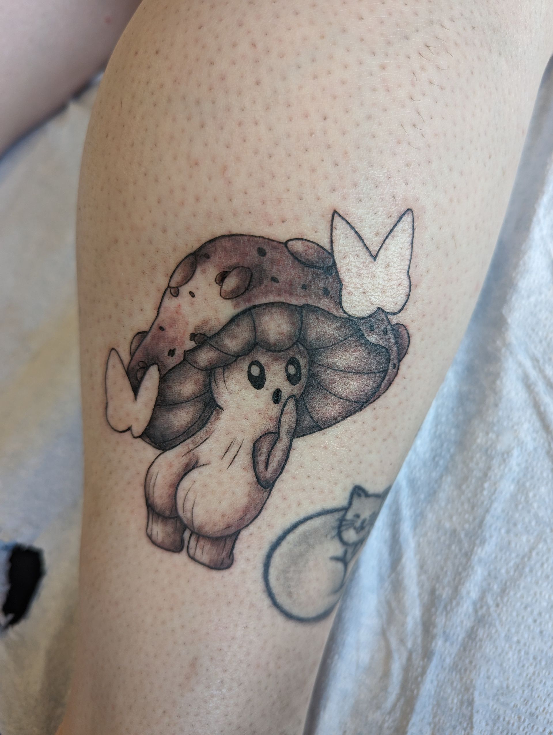 Cheeky Mushroom Tattoo by Samantha Hnatiw at Crimson Empire Tattoo in Edmonton Alberta Canada