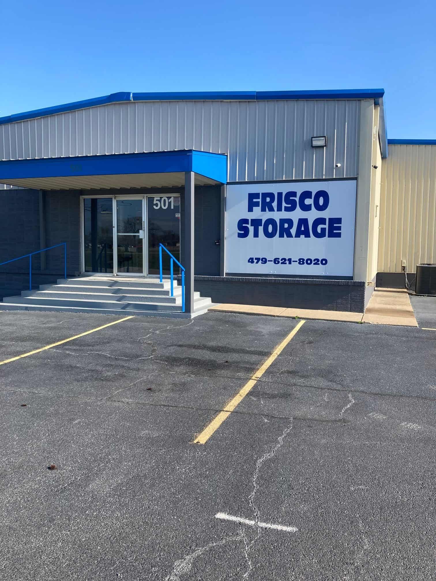 The front of a building with a sign that says frisco storage on it.