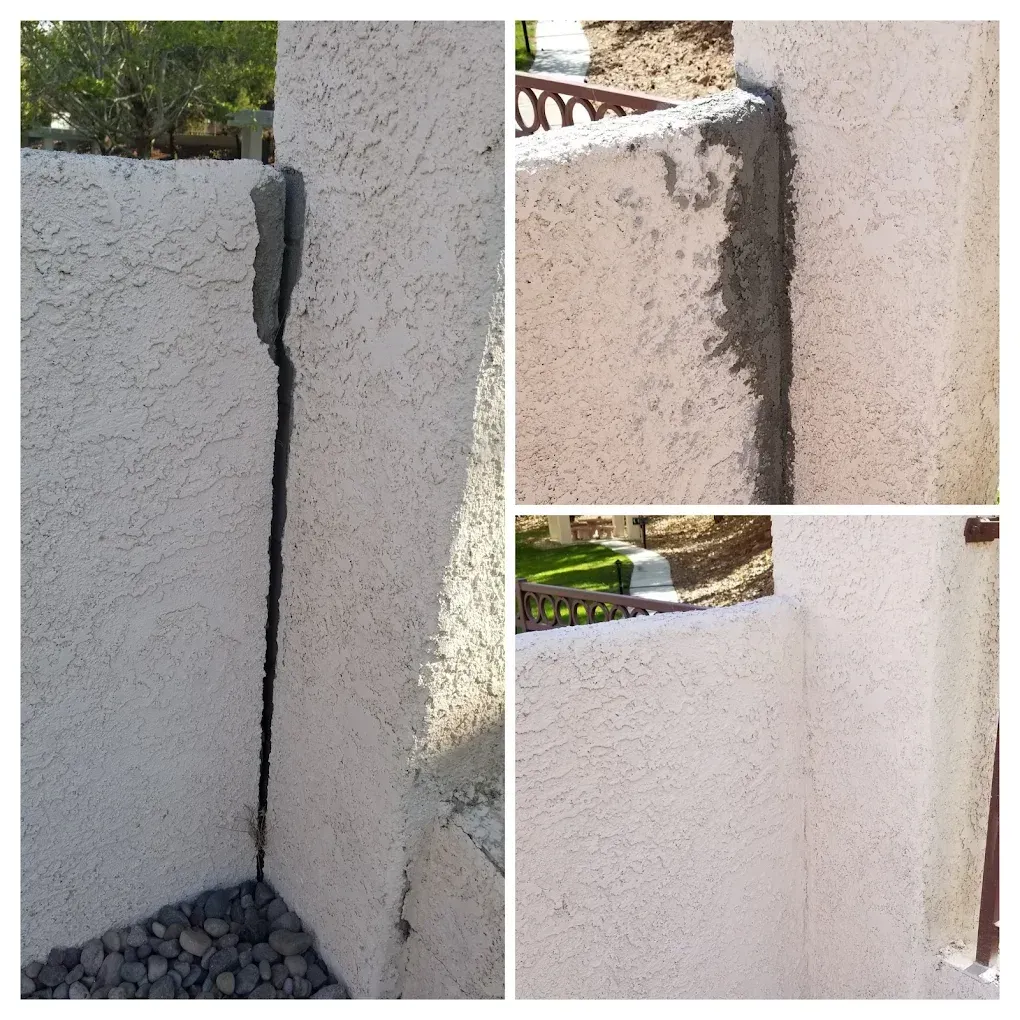 A stucco wall with a large crack.