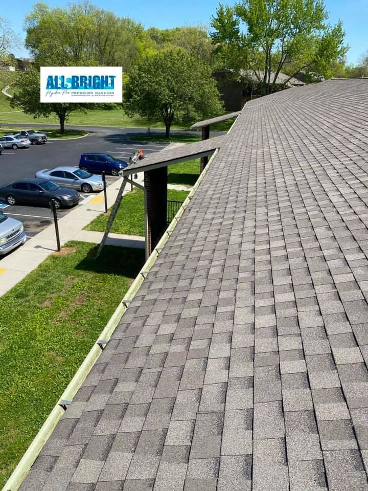 A close up of a roof with a gutter on it.