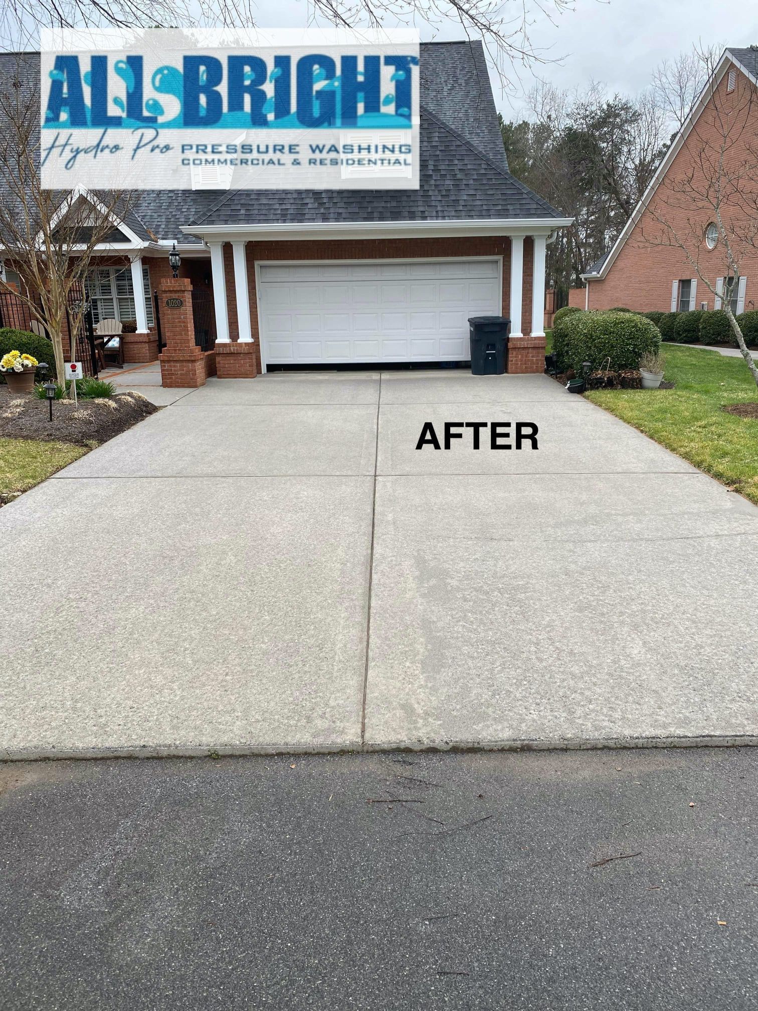 A driveway that has been cleaned by all bright pressure washing.