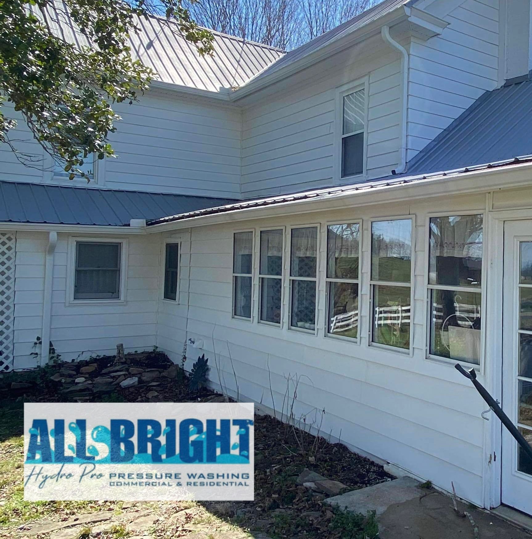 A white house with a sign that says all bright on it