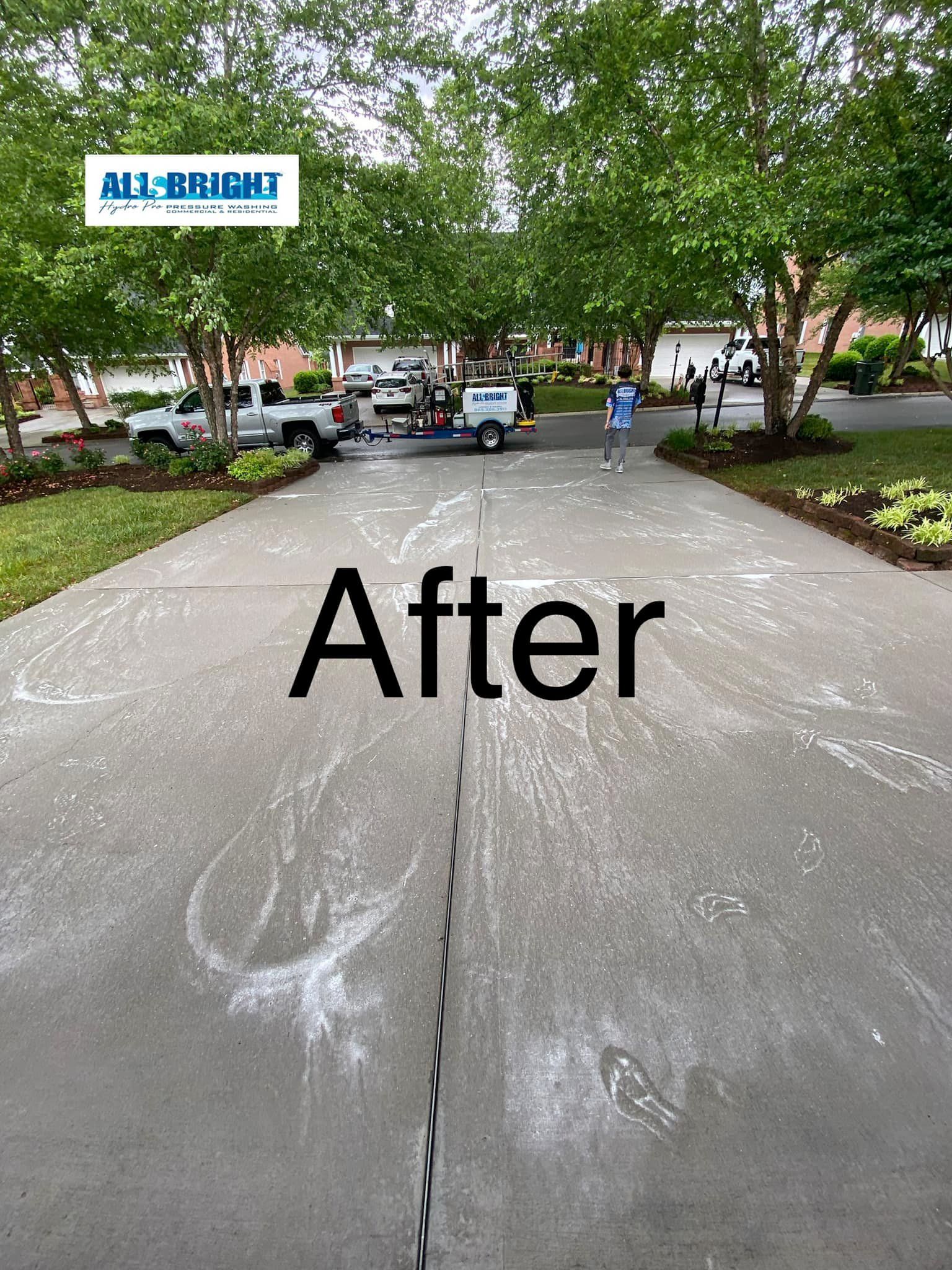 A picture of a driveway after being cleaned.