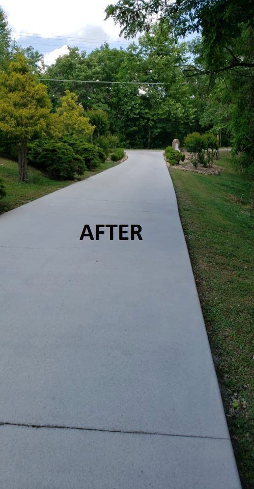 A picture of a concrete driveway after being painted.