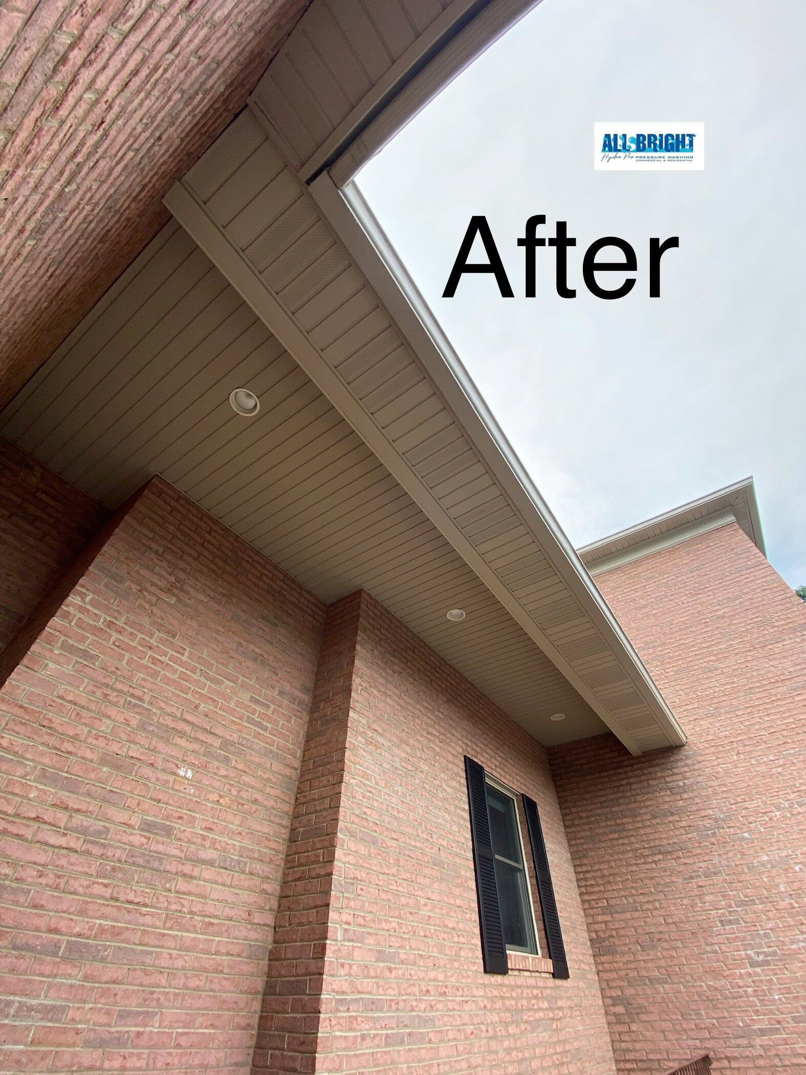 A picture of a house with a roof that has been remodeled.