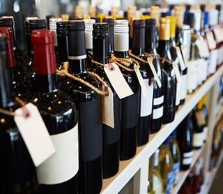 Bottles Of Wine On Display In Delicatessen — Liquor Store in Wilmington, DE