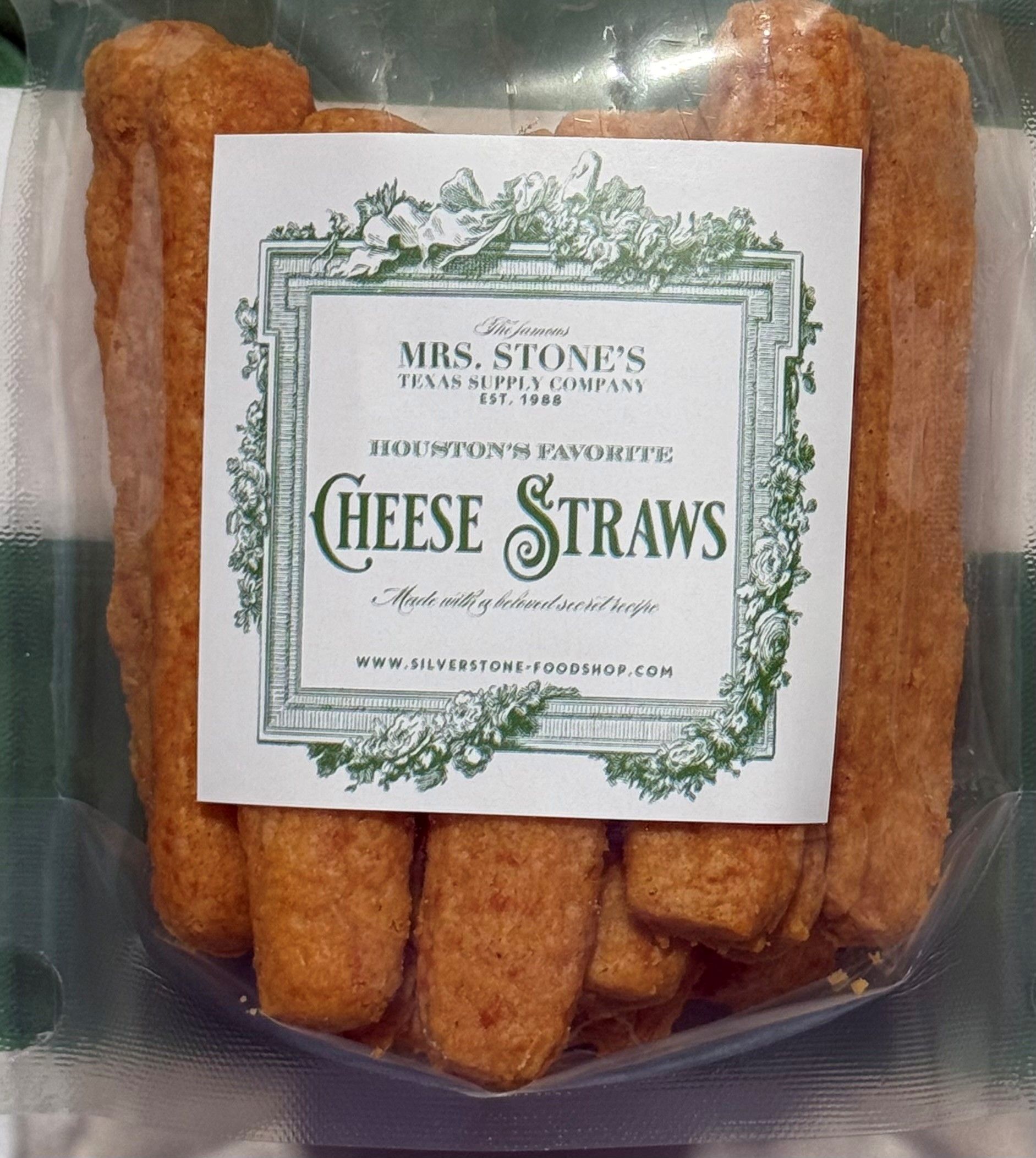 Package of Mrs. Stone's Cheese Straws with label showing text 