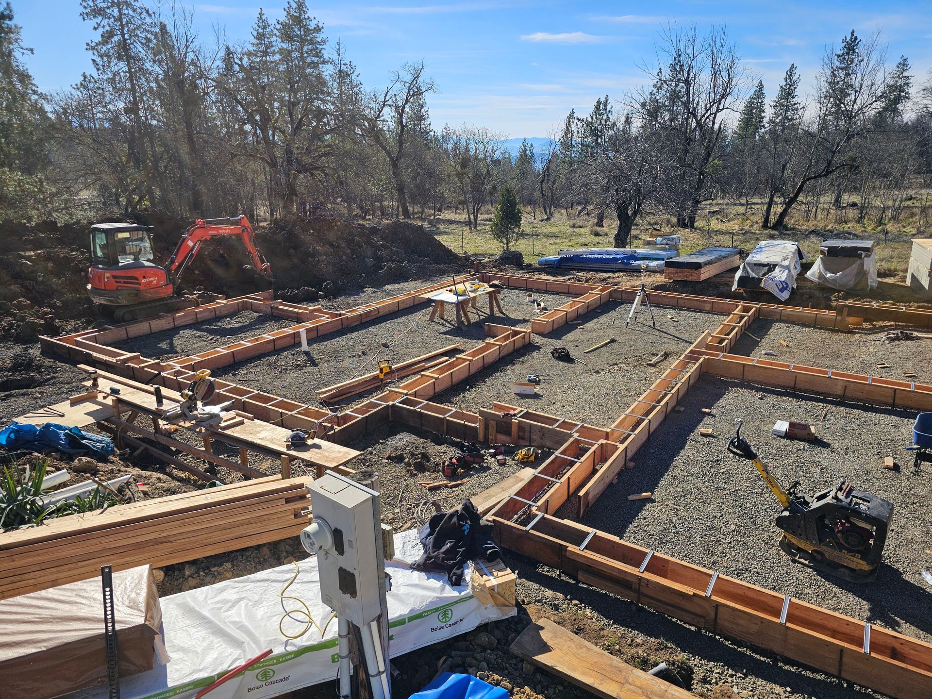 Pre-construction pier installation work being performed by Elite Foundation Repair team in Southern Oregon
