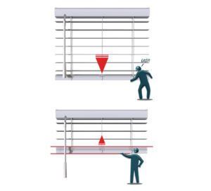 a man is measuring a wooden blind with a tape measure .