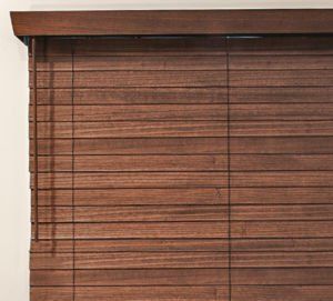 a close up of a OSMO finish option wooden blind on a window .