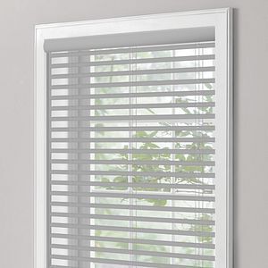 a close up of a window with blinds on it using ring tilt with ring lift