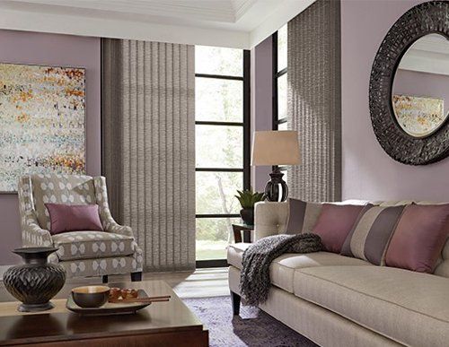a living room with Vertical Sheer Shadings installed by Affordable Blind Pros