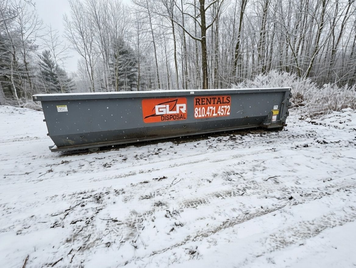 A grey dumpster with 