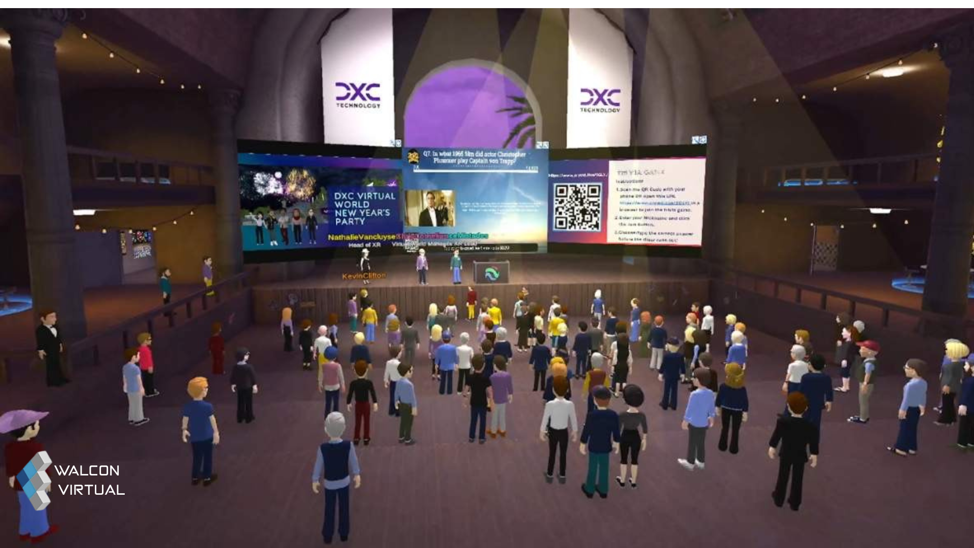 Virtual conference hall with avatars gathered, screens displaying event information.