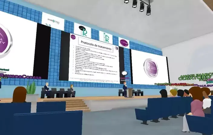 Virtual conference: Speaker at podium, presentation on screen, audience seated. Blue and white interior.