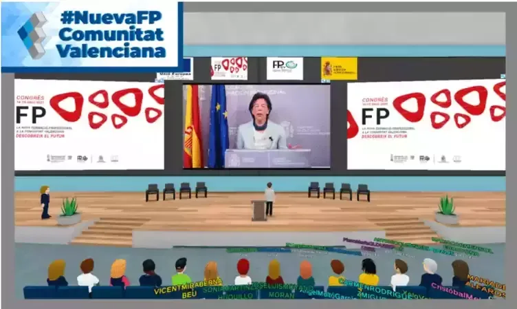 Virtual event: A woman speaks at a podium. Audience of avatars. Stage with blue and wood colors.