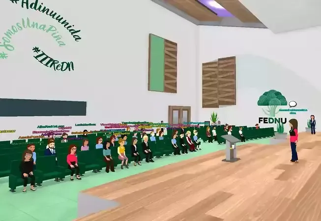 A virtual audience at a FEDUN conference. A speaker stands at a podium in a green-themed room.