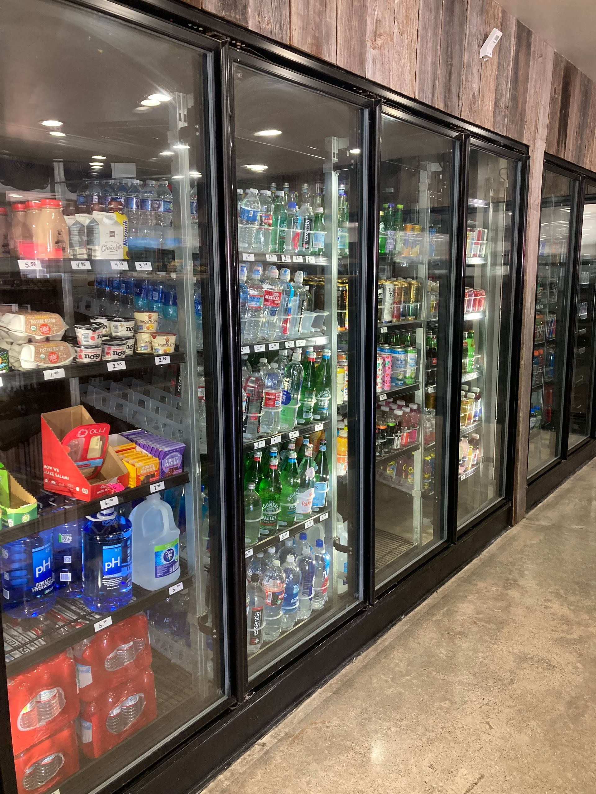 Drink aisle stocked with a variety of beverages at our store.