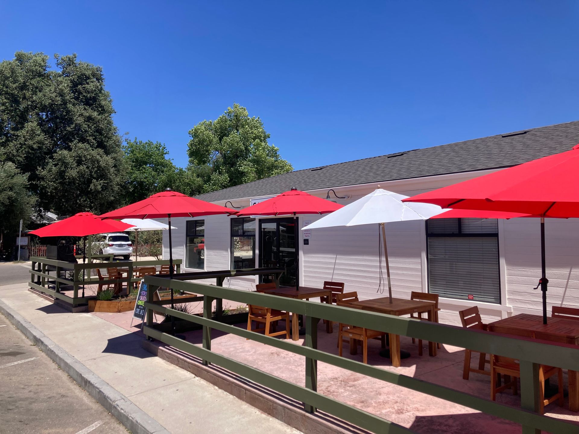 Patio seating for food and for beer and wine at Gandolfo Family Market & Deli