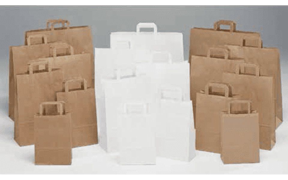 buste di carta bianche e beige