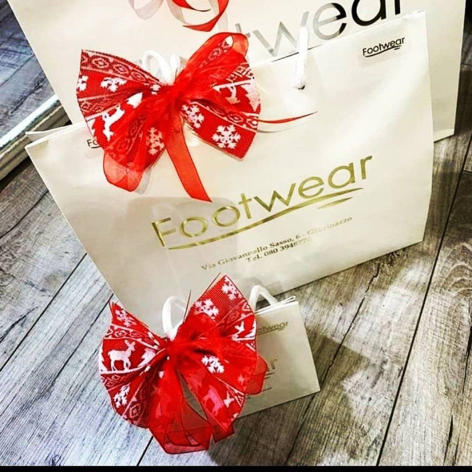 busta plastificata bianca con fiocco