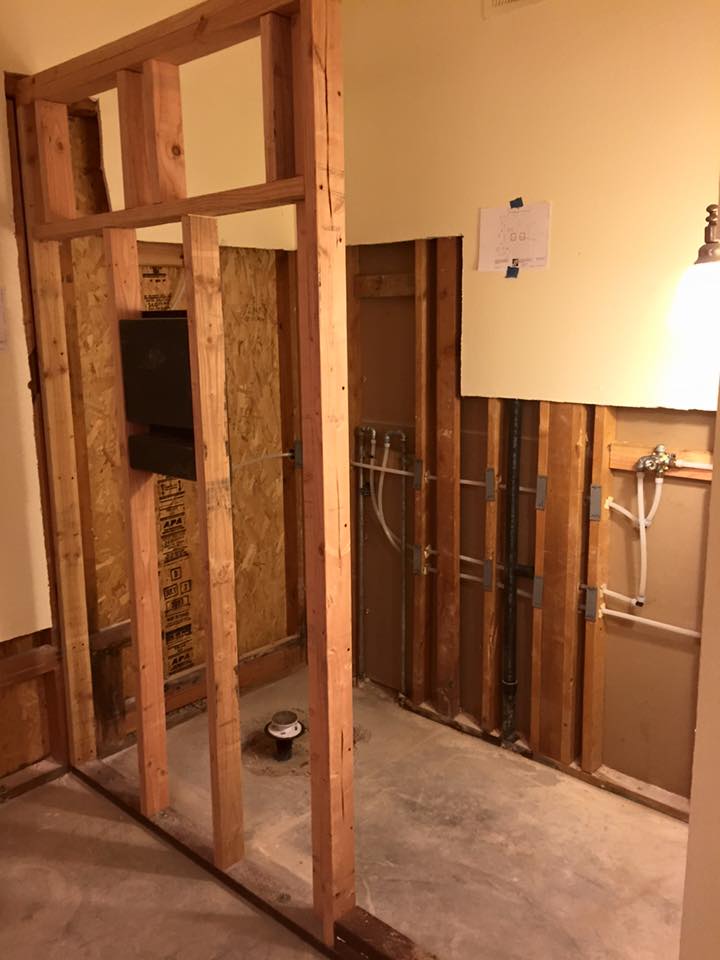 Sewer & Drain Cleaning Specialists — Side View of Wooden Side of Shower Room in Tulare, CA