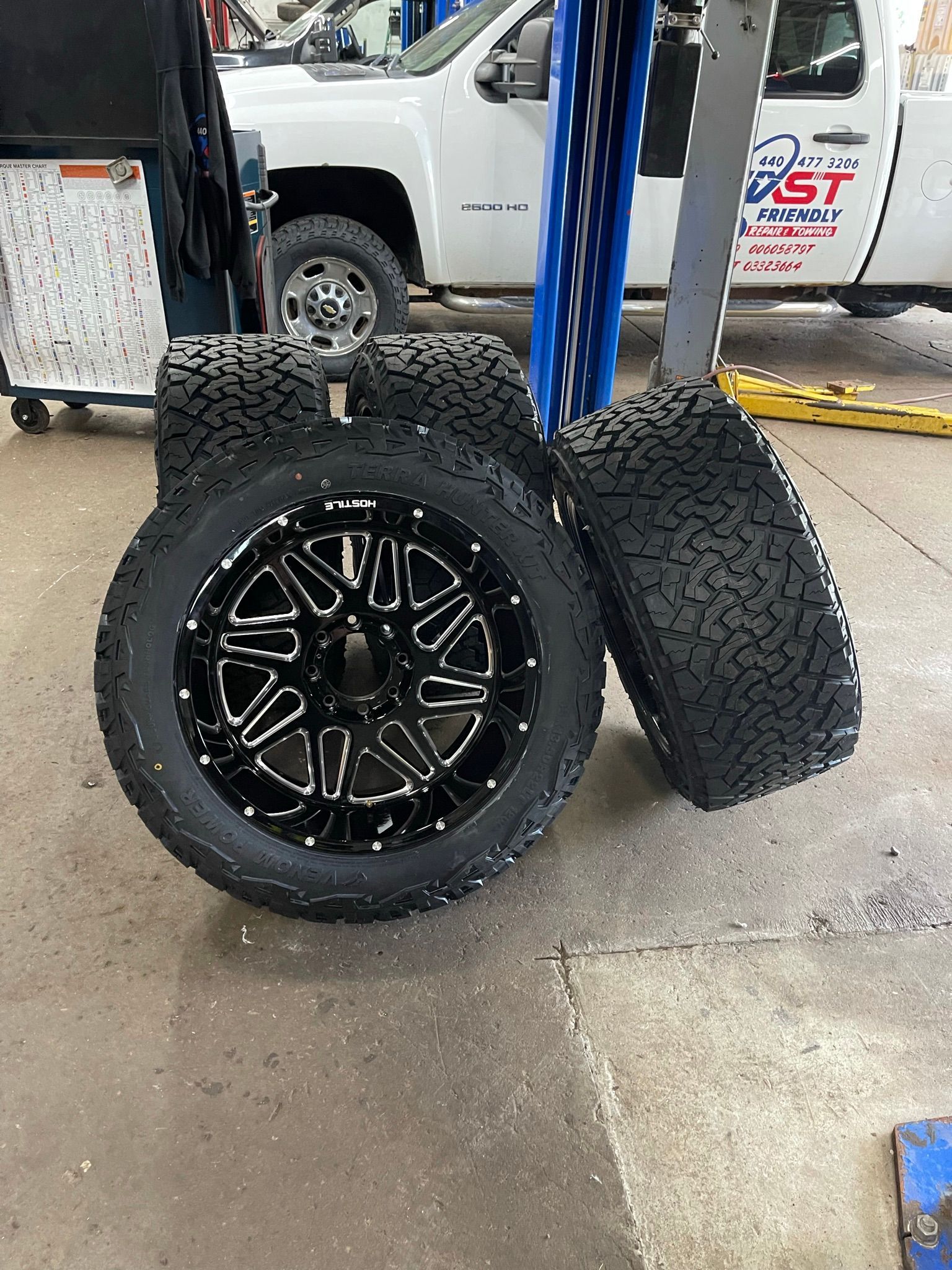 A set of new truck tires and wheels.