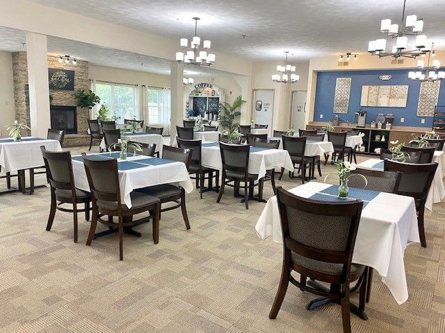 A large dining room filled with tables and chairs.