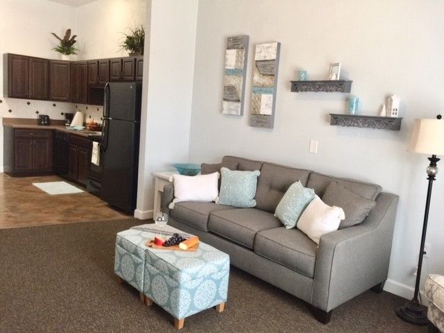 A living room with a couch and a coffee table