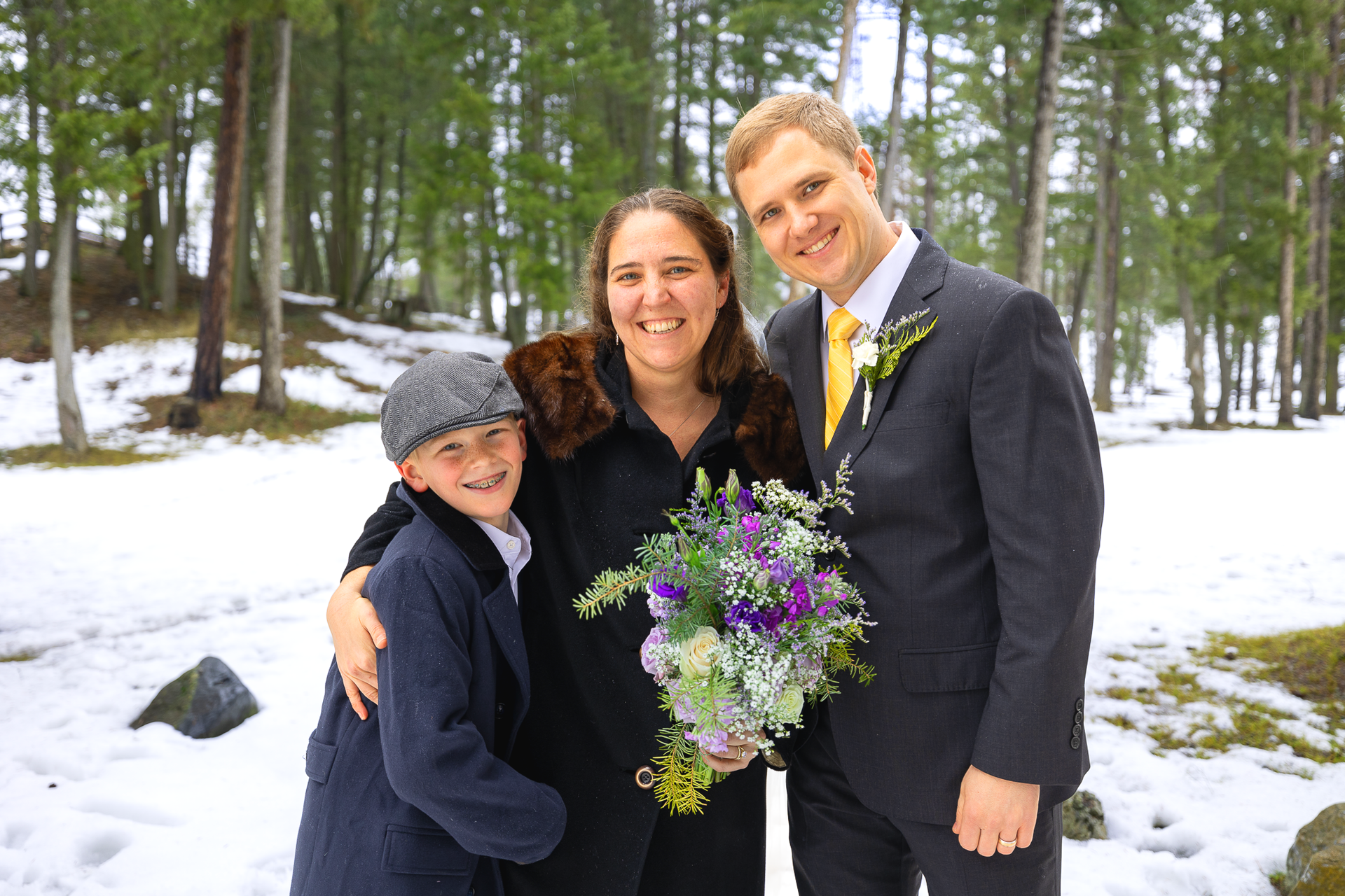 Bride and groom with their ring bearer