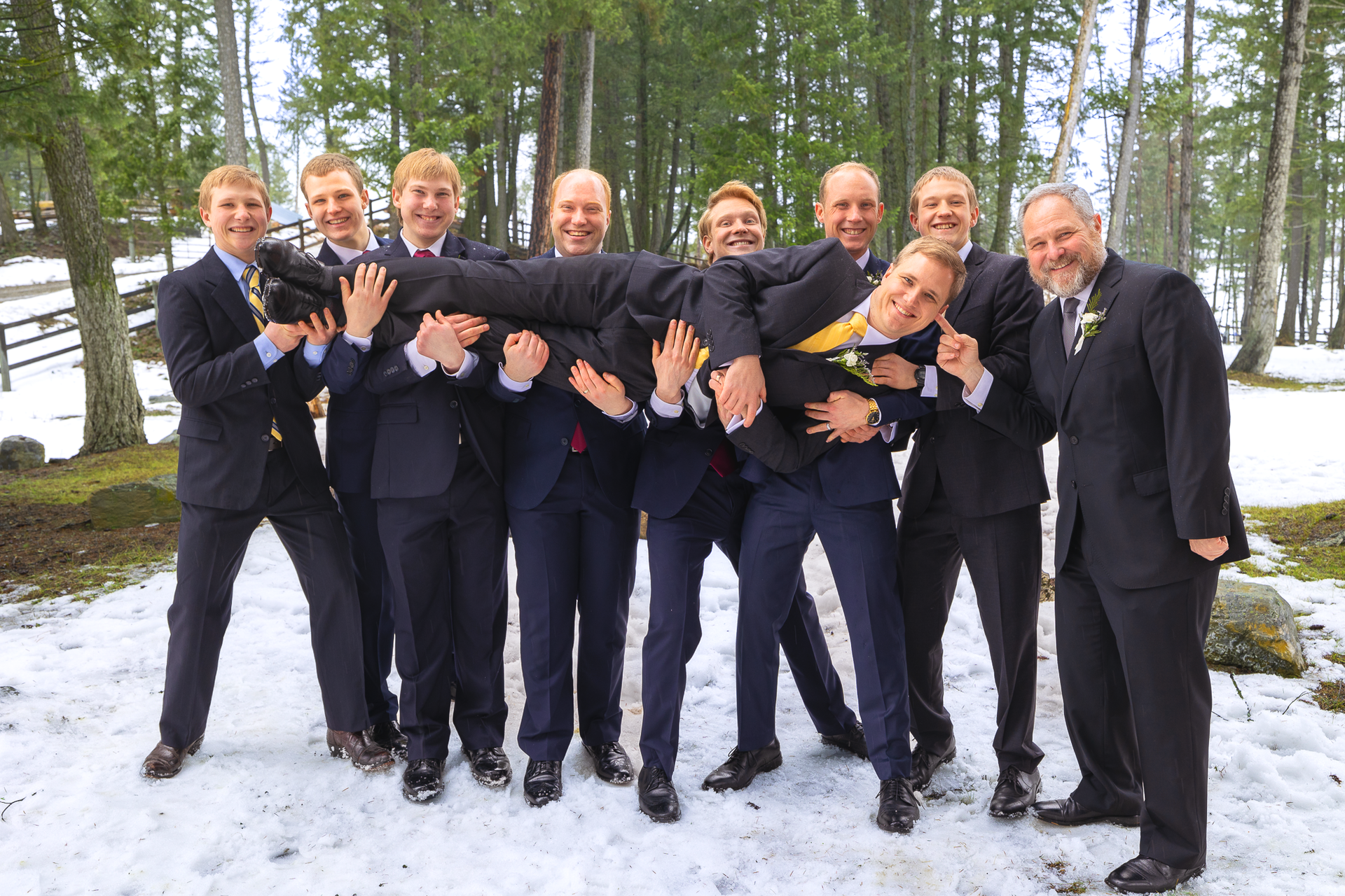 Goofy groomsmen posing for a photo