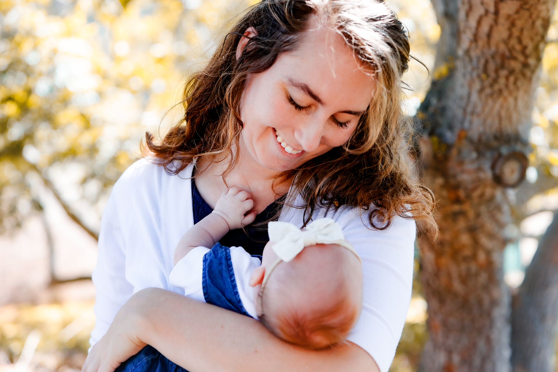 A beautiful mother holding her child.