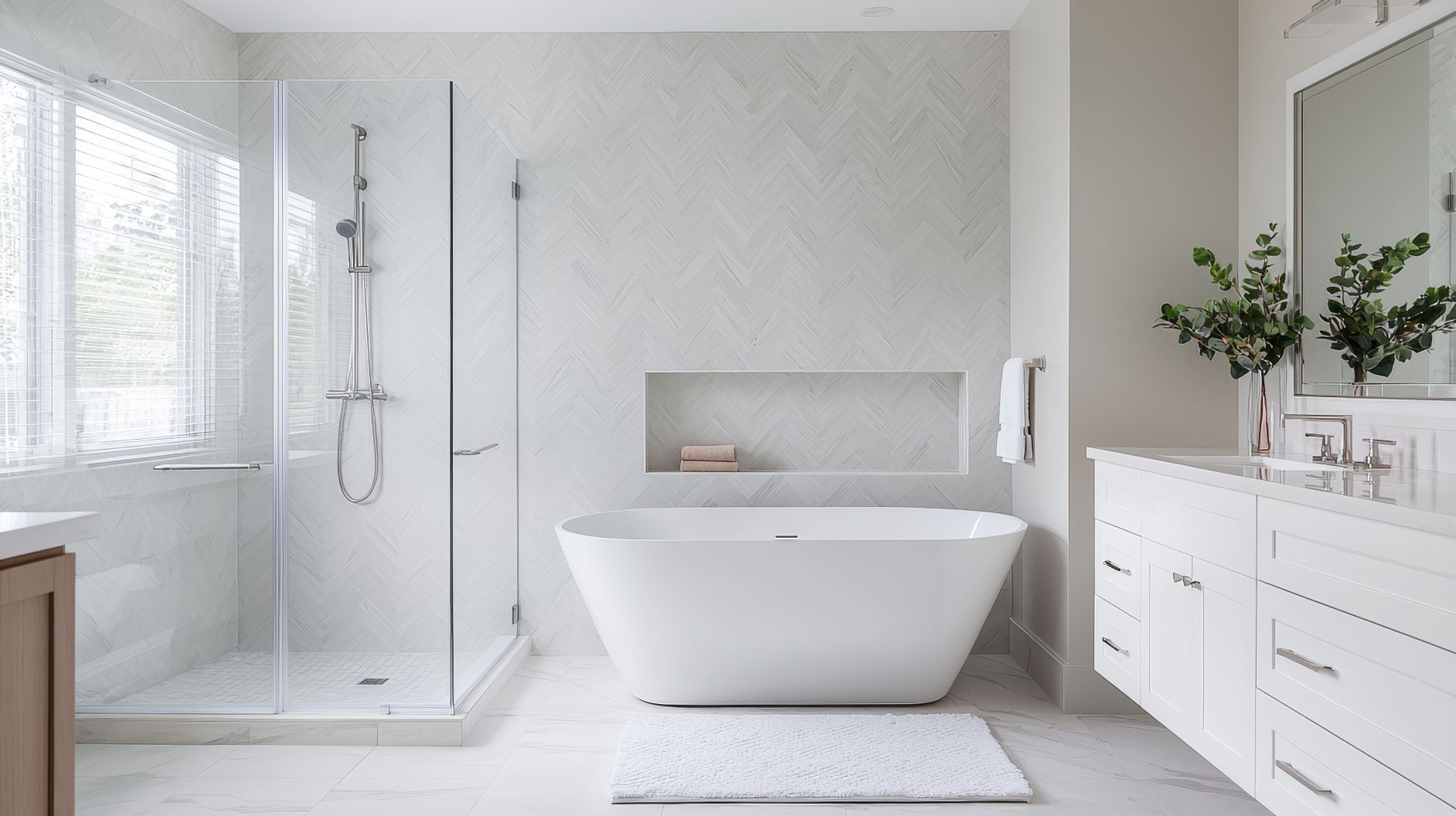 A bathroom with a tub , sink , mirror and shower.